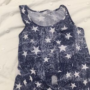 A white star blue tank top